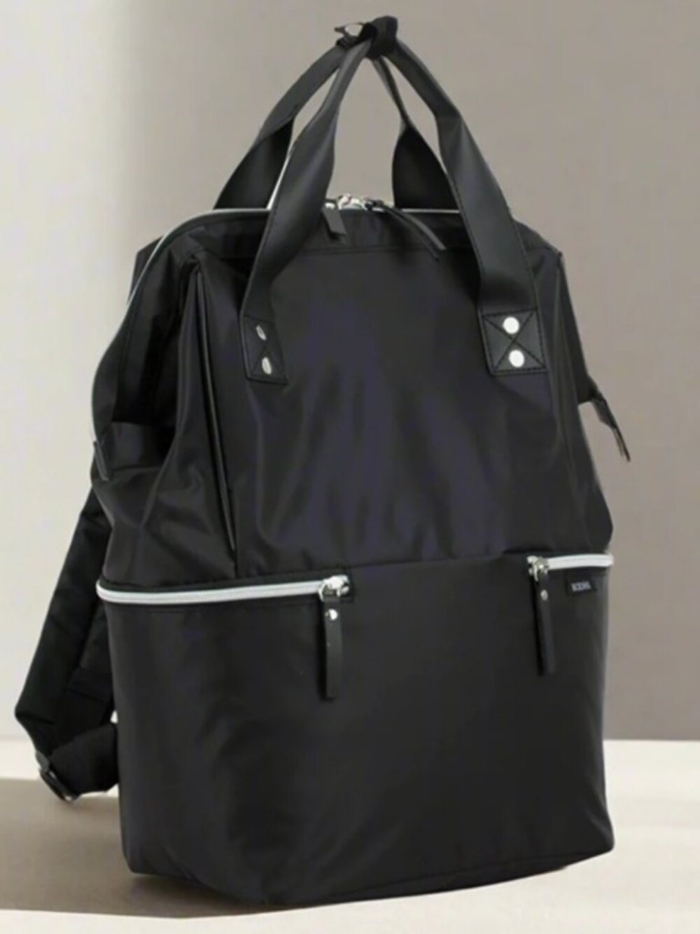BODHI doctor bag style top load backpack bag.